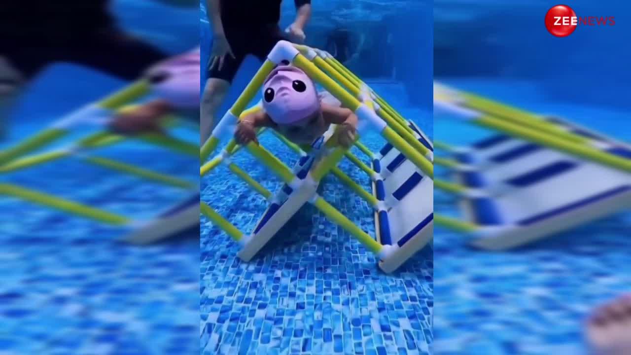 2 साल की बच्ची ने प्रोफेशनल स्वीमर जैसी लगाई स्विमिंग पूल में डाइव, लेकिन ये वाला स्टंट देख हैरत में पड़े यूजर्स