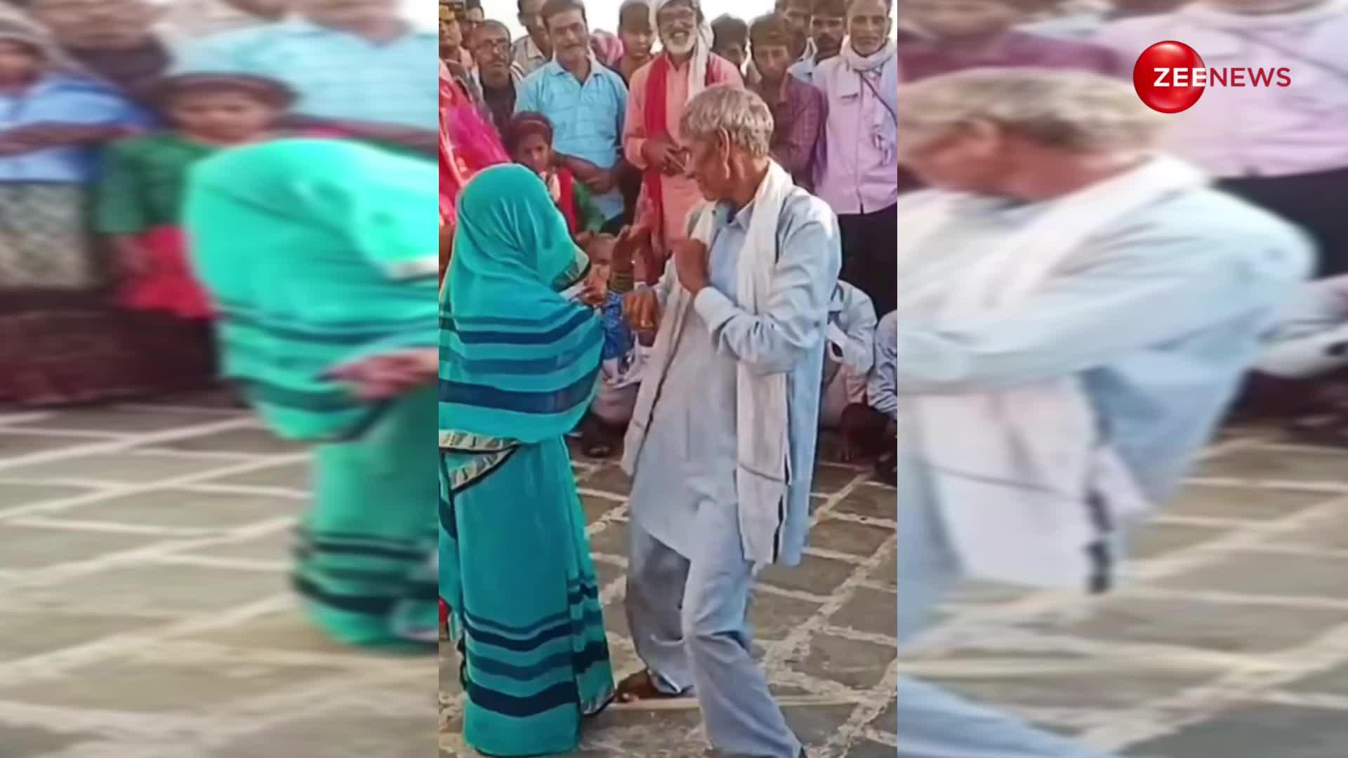 80 साल के दादा-दादी को चढ़ी जवानी, बीच सड़क में रोमांटिक होकर लगाए ठुमके