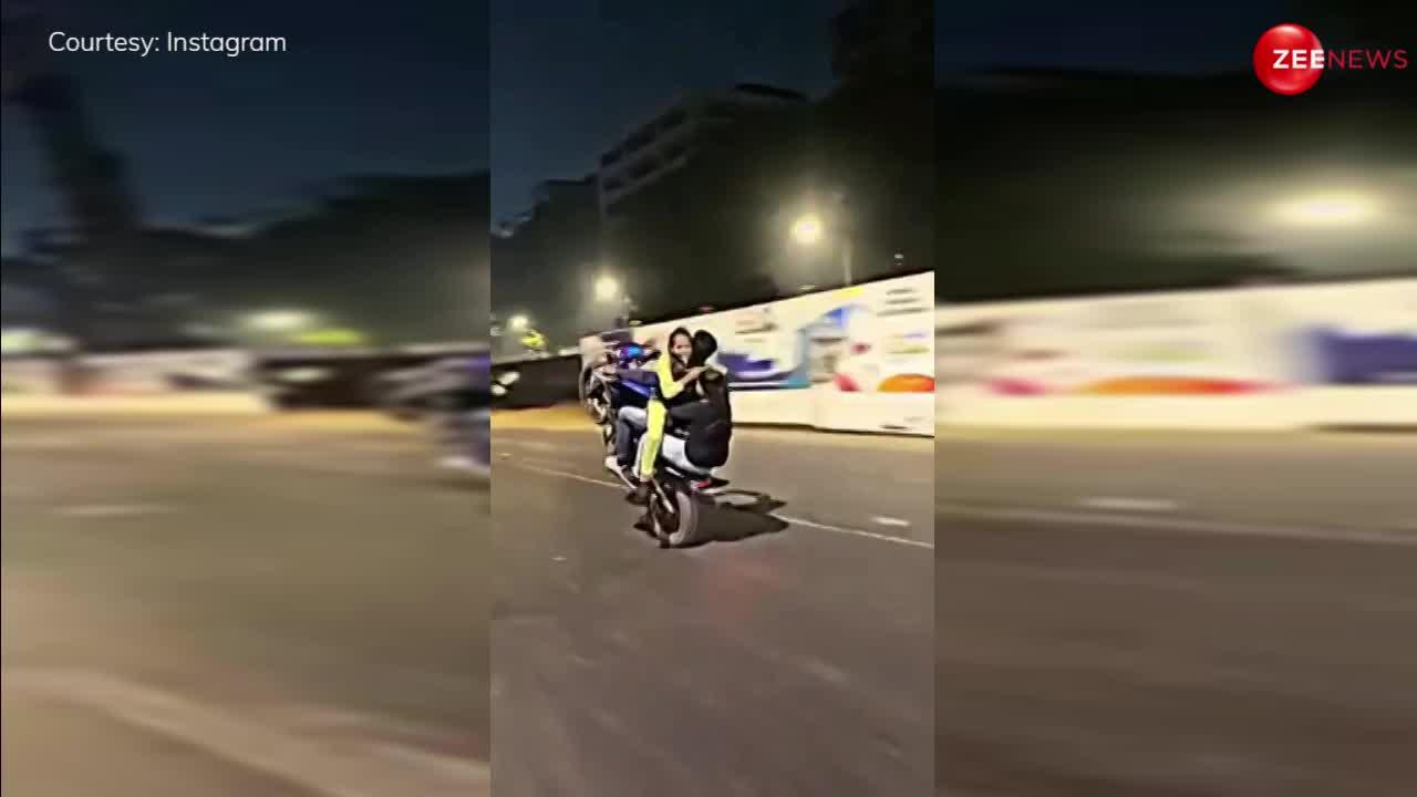 लड़कियों को गोदी में बैठाकर बाइक पर स्टंट दिखा रहा था लड़का, पुलिस ने दर्ज किया केस; Viral Video