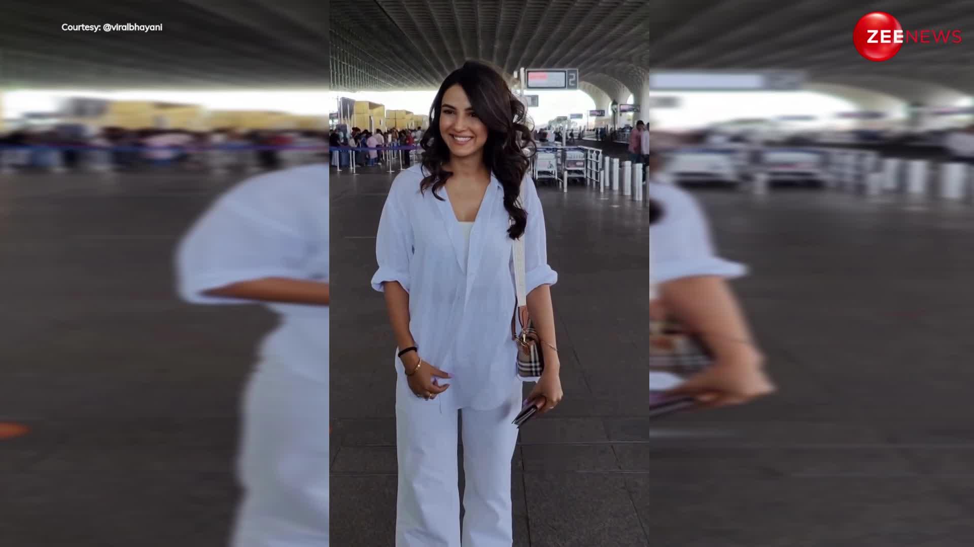 एक्ट्रेस Jasmin Bhasin ने एयरपोर्ट पर कैमरे के सामने दी इतनी बड़ी स्माइल, लोग बोले- इसे कोलगेट के ऐड में भेज दो