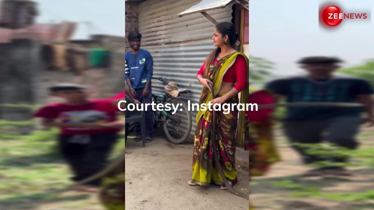 Snake Video: साड़ी पहन जहरीला सांप पकड़ने पहुंचीं महिला, नाग के अटैक से बाल-बाल बची