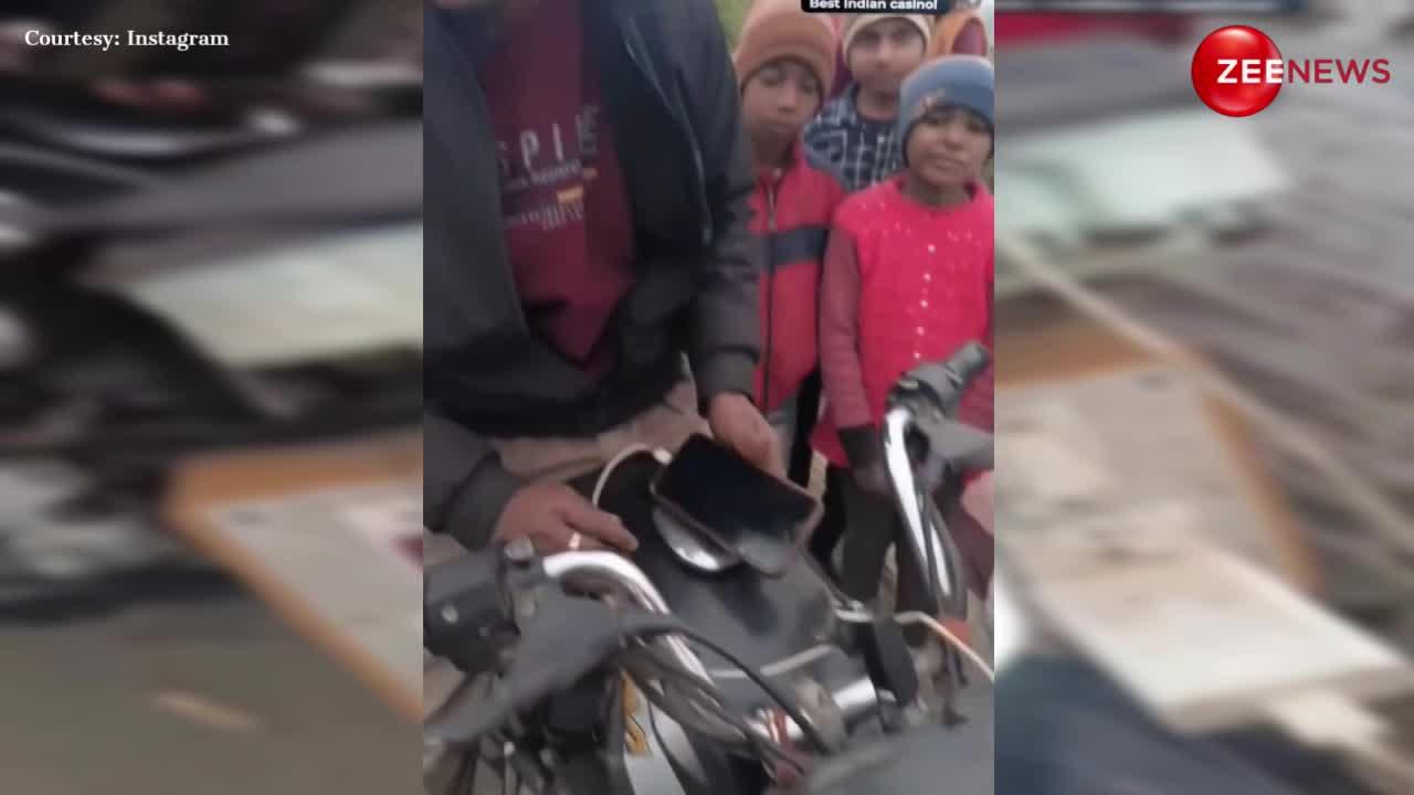 Desi Jugaad Video: बल्ब भी जलेगा और मोबाइल भी होगा चार्ज, शख्स ने जुगाड़ू तरीके से बना डाली गजब की ई-बाइक