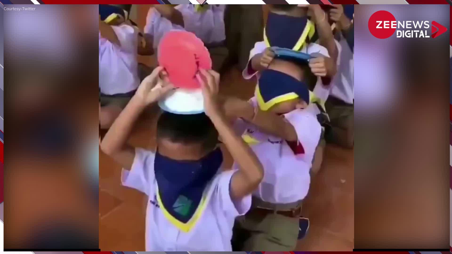 Viral Video: स्कूल में आंख पर पट्टी बांधकर और हाथ में आटा लिए बच्चों ने खेला ऐसा गेम, देख हर किसी को याद आया अपना बचपन