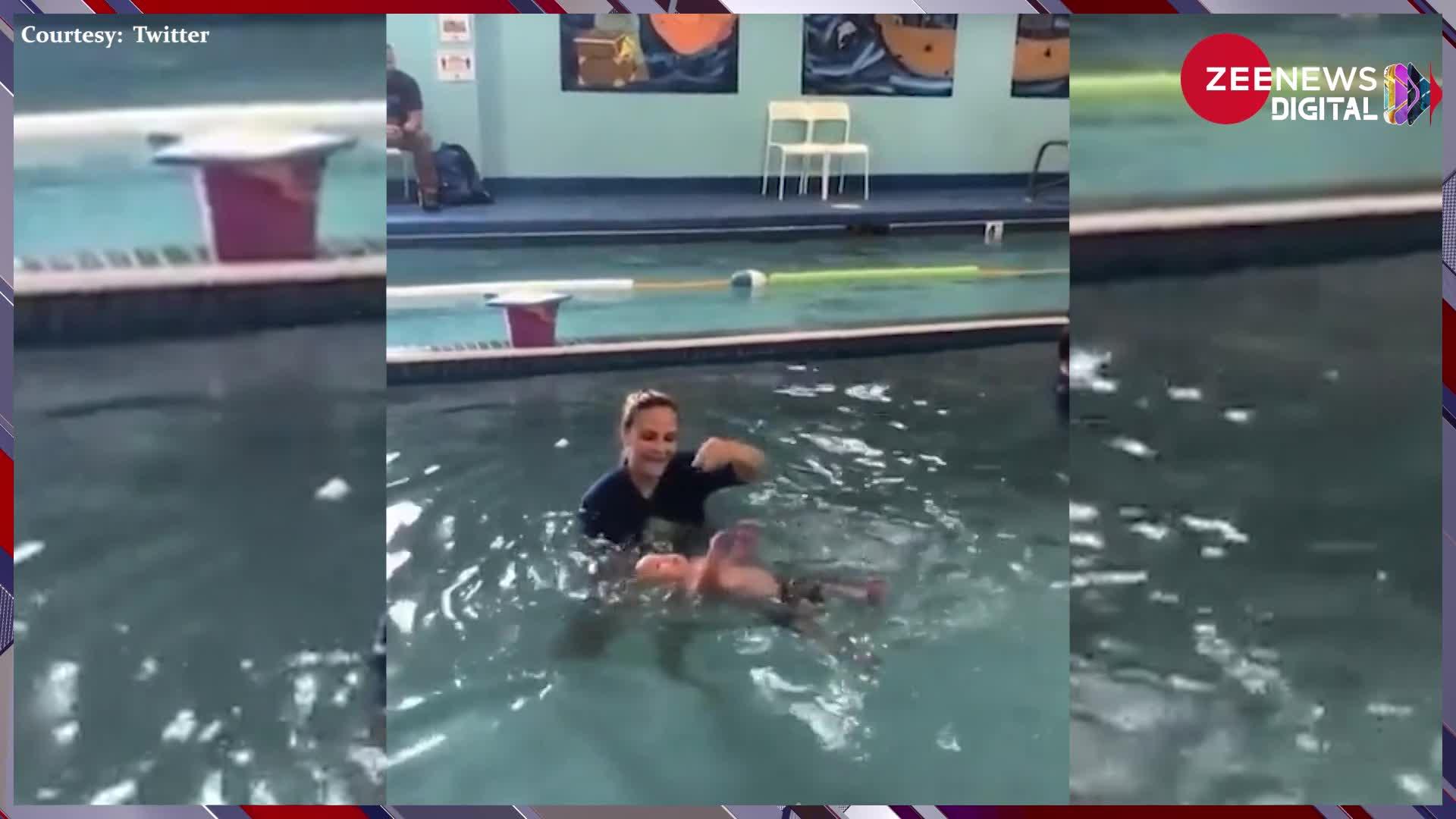 Shocking Video: छोटे बच्चे को तैरना सिखाने के लिए महिला ने किया कुछ ऐसा, देख दंग रह गया हर कोई