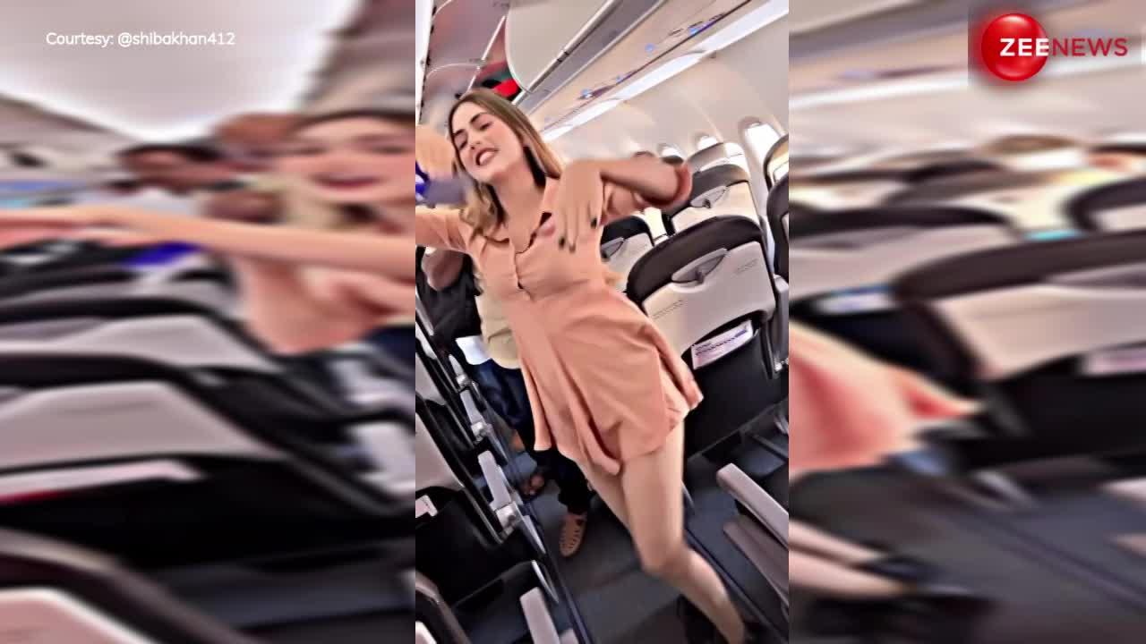 Viral Video: यात्री चढ़ रहे थे फ्लाइट में तभी लड़की उछलते हुए करने लगीं ये काम, देख भड़के लोग....