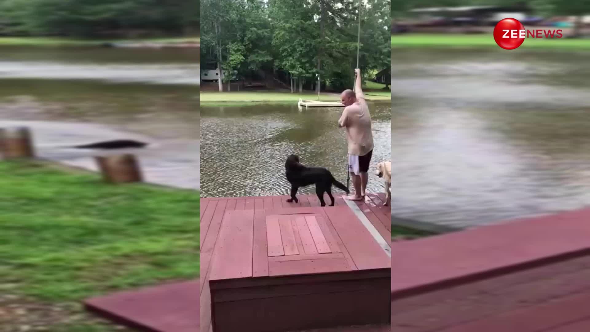कुत्ते ने मालिक को बचाने के लिए पानी में लगाई छलांग, वीडियो हो रहा वायरल