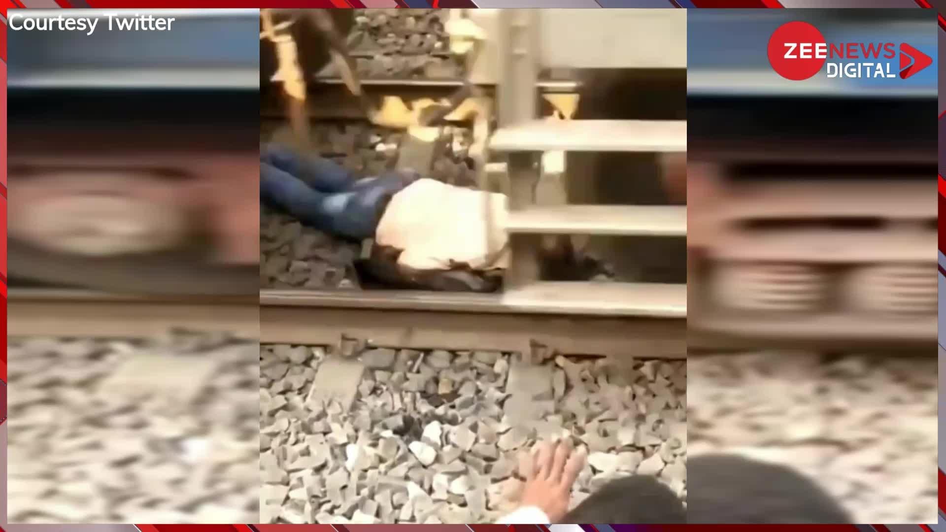 Railways Viral Video: पटरियों को पार करके प्लेटफॉर्म पर जा रहा था शख्स, अचानक आई ट्रेन.., देखें वायरल Video