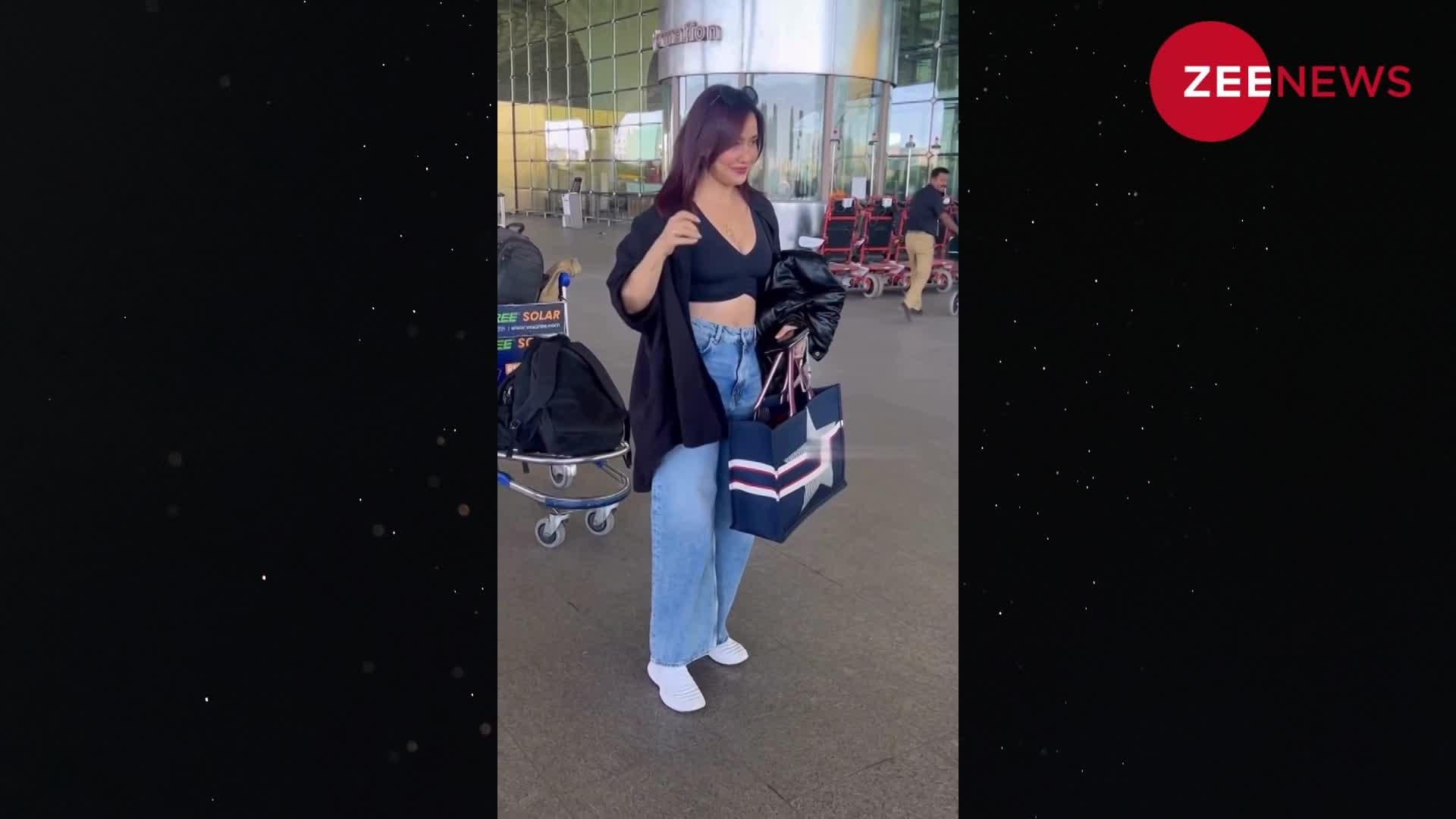 ब्लैक डीपनेक टॉप में Neha Sharma लगीं बला की खूबसूरत, एयरपोर्ट लुक देख दीवाने हुए लोग