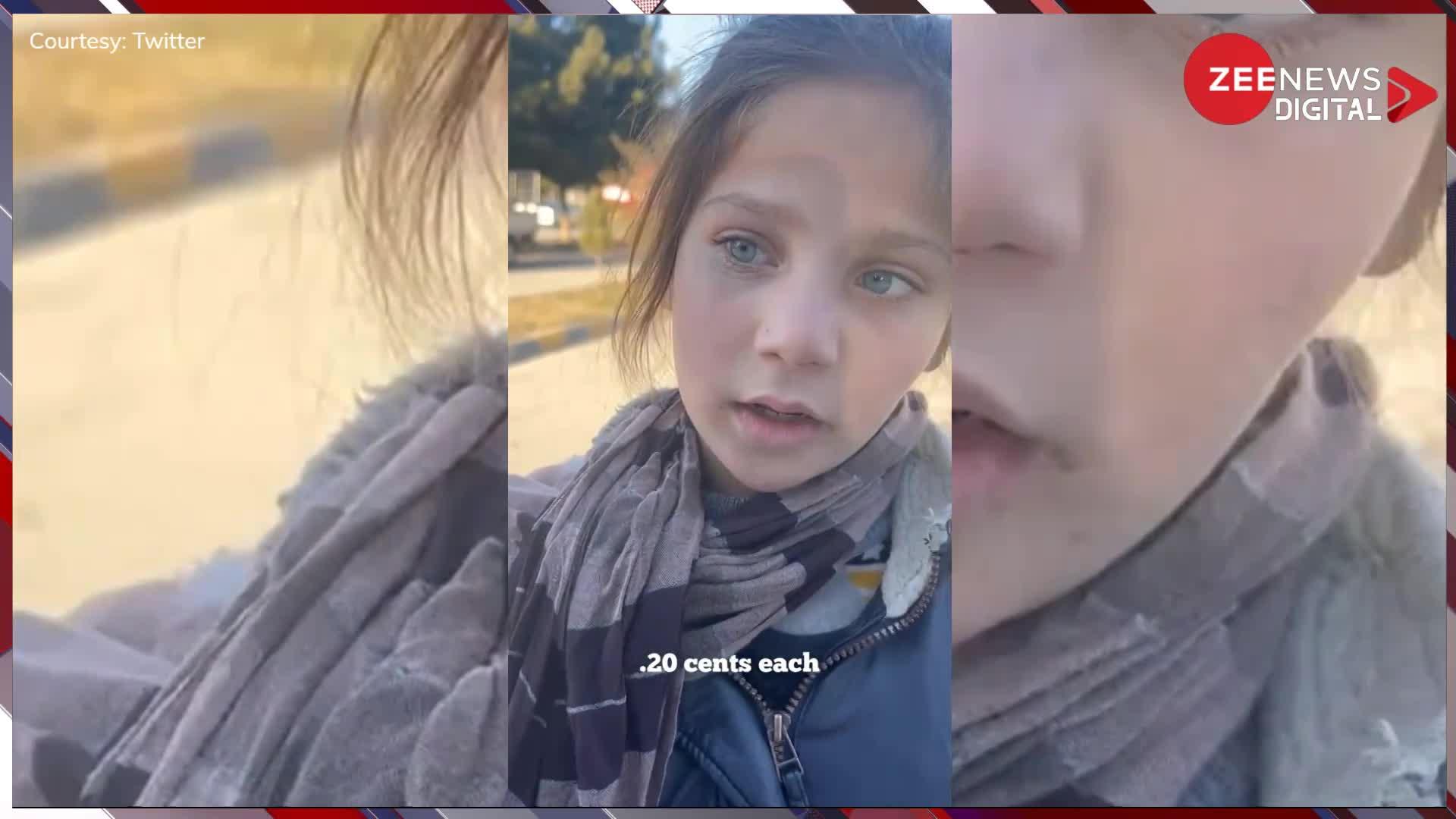 Viral Video: सड़क किनारे पेन बेच रही बच्ची से महिला ने खरीद लिए सारे पेन, लड़की के चेहरे की मुस्कान हो गई वायरल