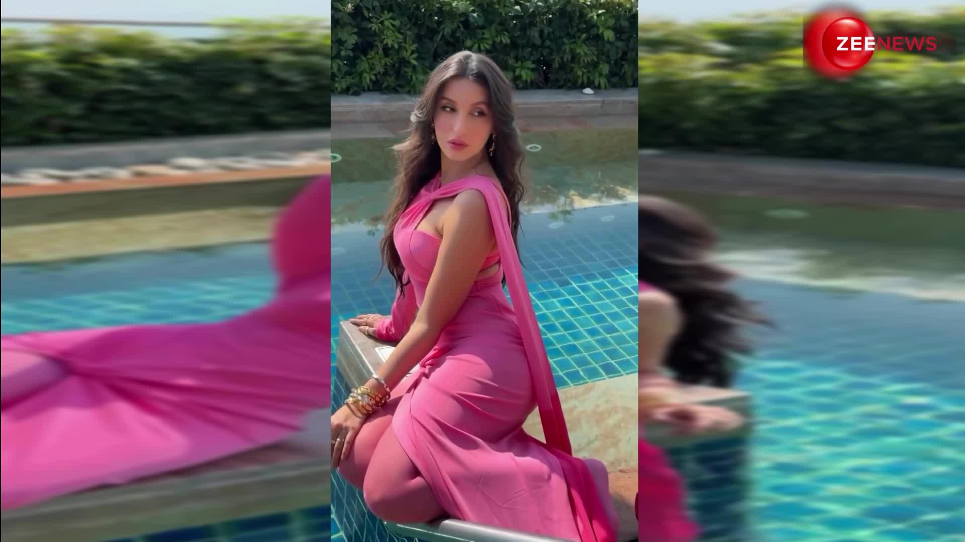 VIDEO: स्विमिंग पूल के किनारे Nora Fatehi ने कराया फोटोशूट, पिंक ड्रेस में दिखा सिजलिंग अवतार, फैंस हुए दीवाने