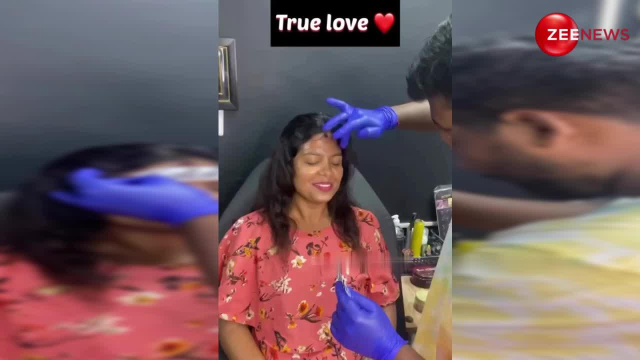 महिला ने पति के नाम का सिर पर करवाया टैटू, वीडियो देख लोग बोले- ये प्यार नहीं पागलपन है