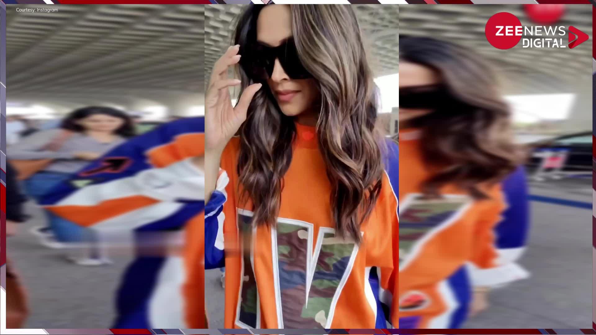 ऑरेंज ओवरसाइज टी-शर्ट में दीपिका पादुकोण (Deepika Padukon) ने एयरपोर्ट पर बढ़ाई गर्मी, जिसे देख फैंस बोले ये तो बॉलीवुड की क्वीन है