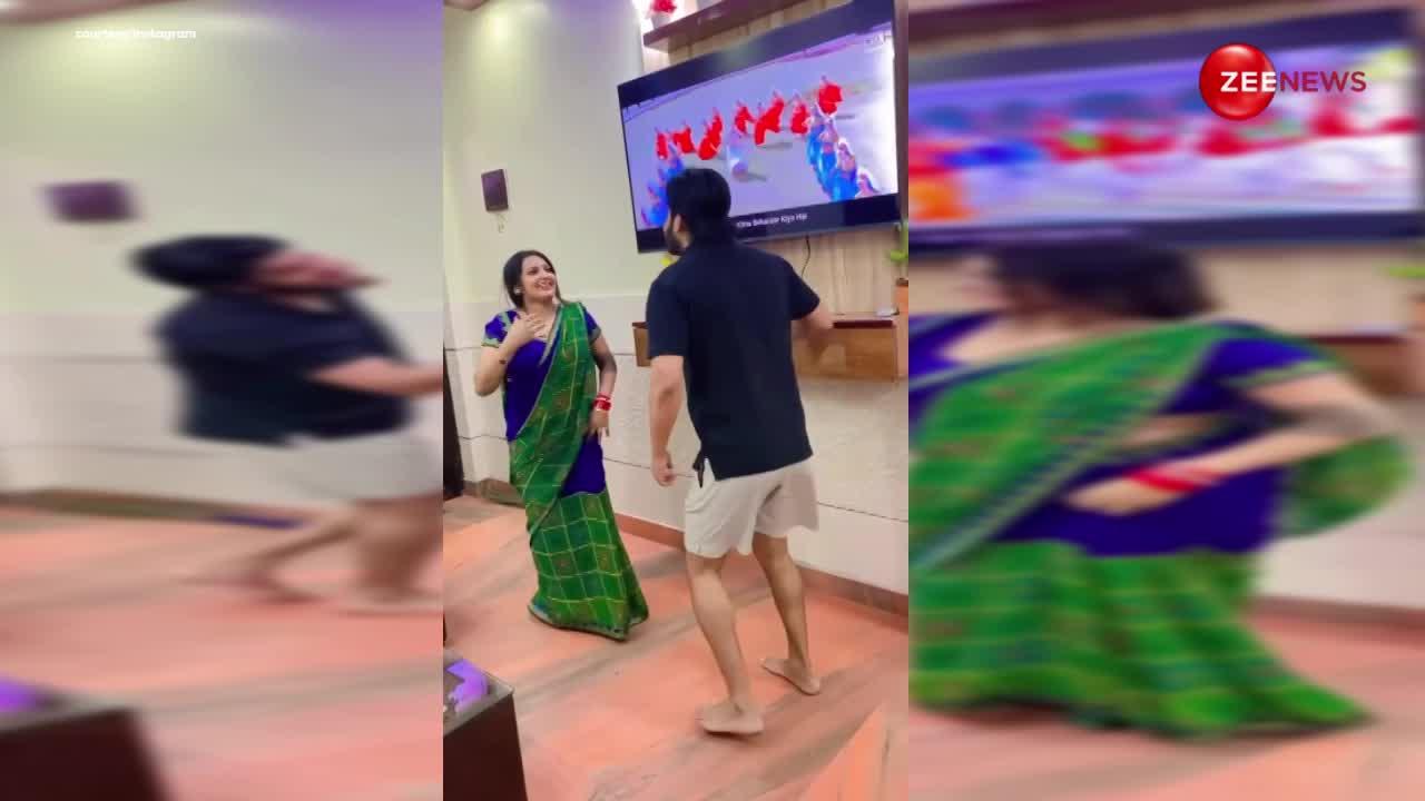 पति-पत्नी ने गोविंदा और करिश्मा के गाने पर किया डांस, देखता रहा छोटा सा बच्चा