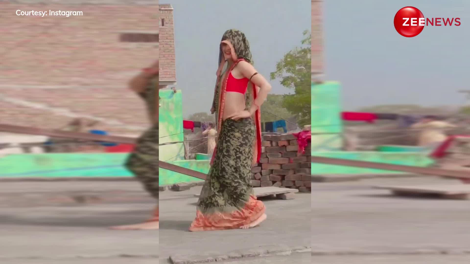 Bhabhi Hot Dance: स्लीवलेस ब्लाउज पहन के गांव की भाभी नें मटकाईं कमर, डांस देख आशिकों की जान पर बन आई बात