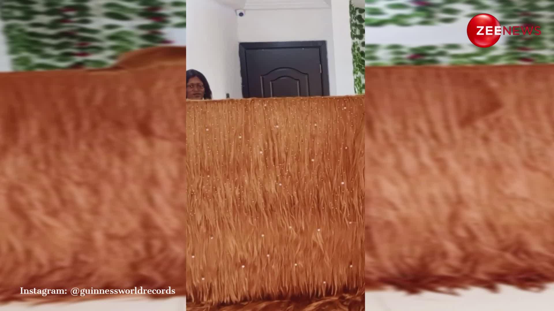 Viral Video: महिला ने बालों की Wig से बना डाला वर्ल्ड रिकॉर्ड, वीडियो देख उड़ जाएंगे आपके होश
