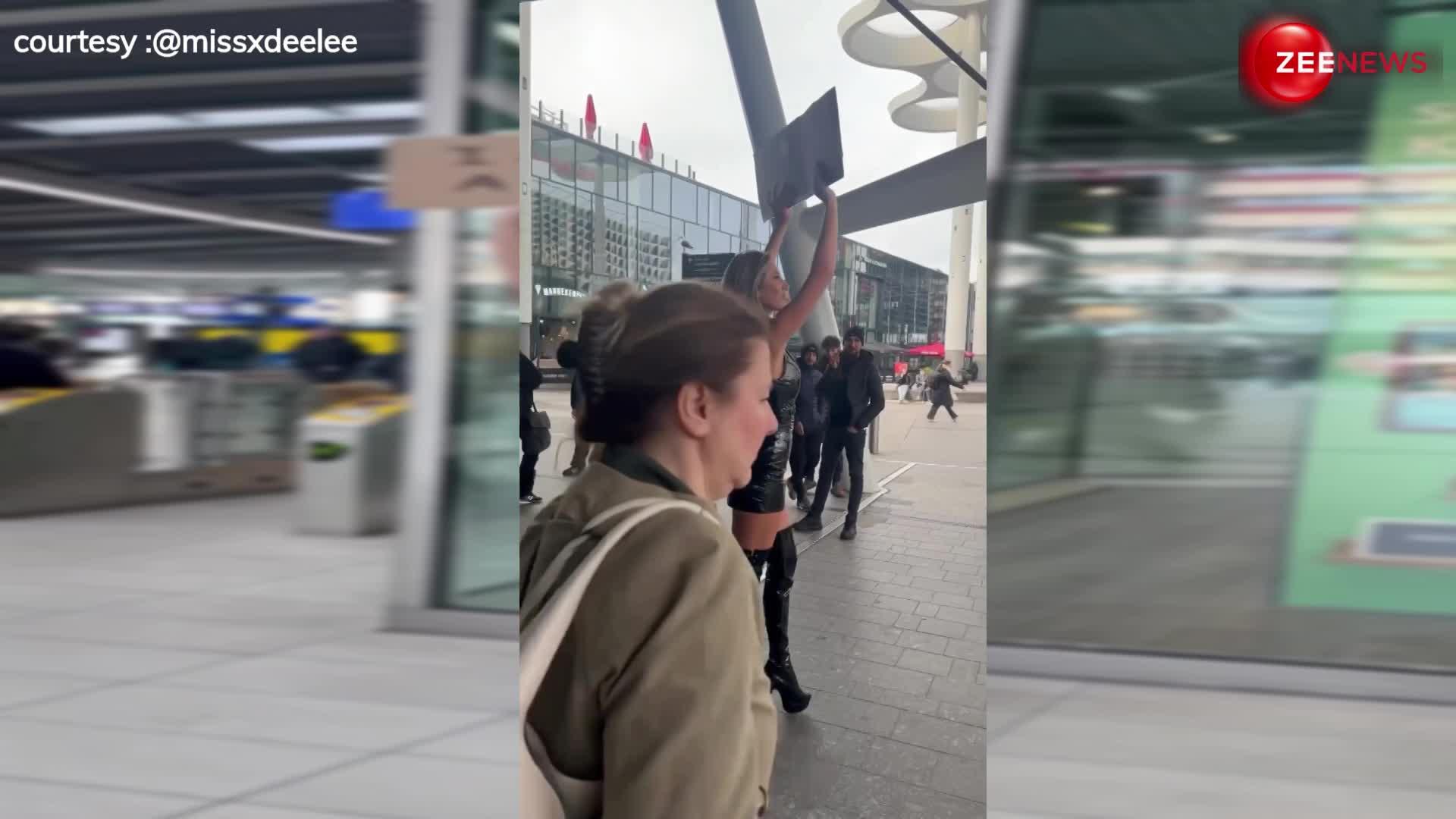 इस विदेशी महिला को चाहिए a human dog..एयरपोर्ट पर बोर्ड लगाकर किया ऐसे प्रचार- देखें वायरल video