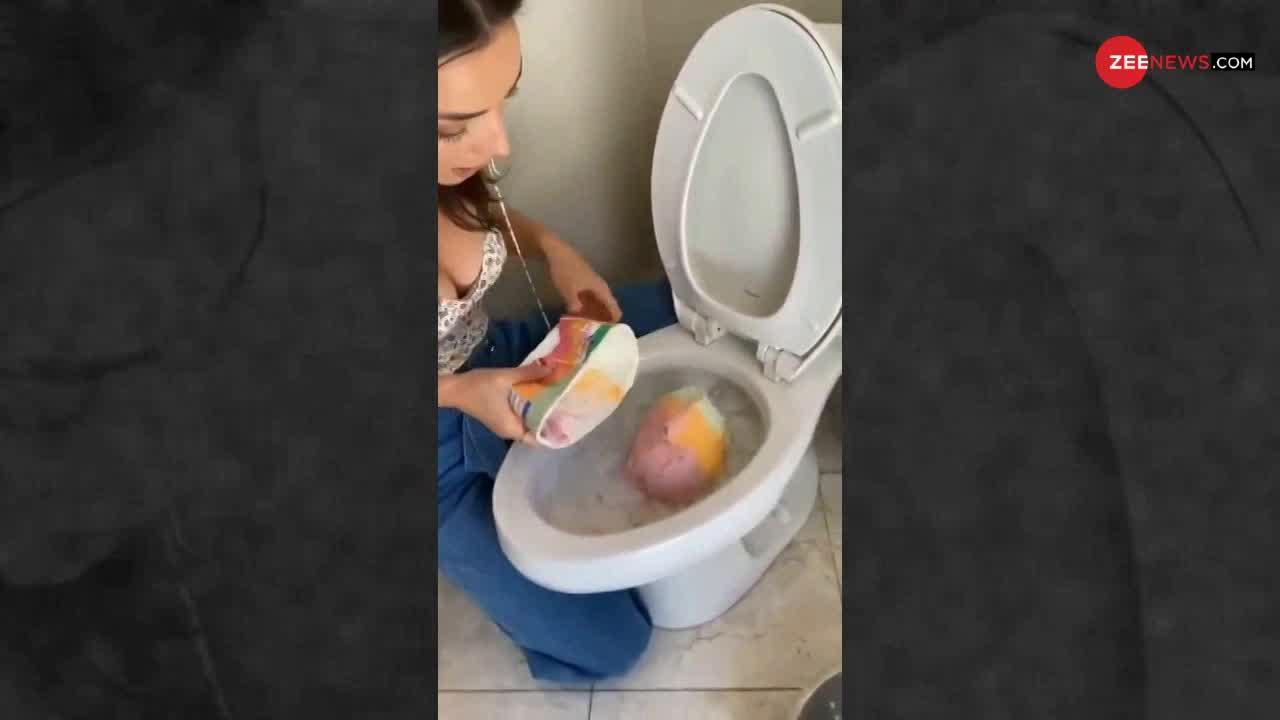 Viral Video: महिला ने Toilet के अंदर बनाई पार्टी Drink, Social Media पर लोग देख हुए हैरान