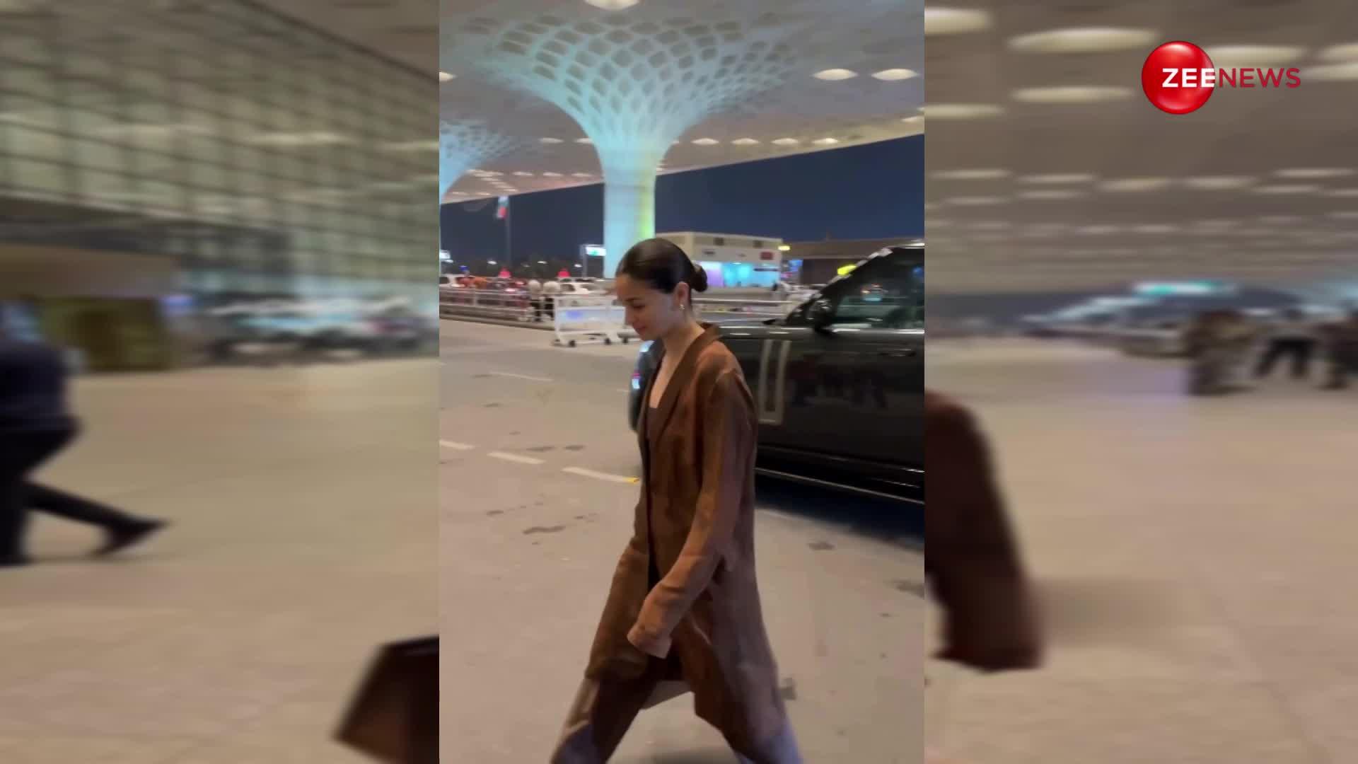 हाथ पर लाखों की बैग के साथ ओवरसाइज्ड कोट पहन एयरपोर्ट पर नजर आईं Alia Bhatt, ड्रेसिंग की वजह से हुईं ट्रोल