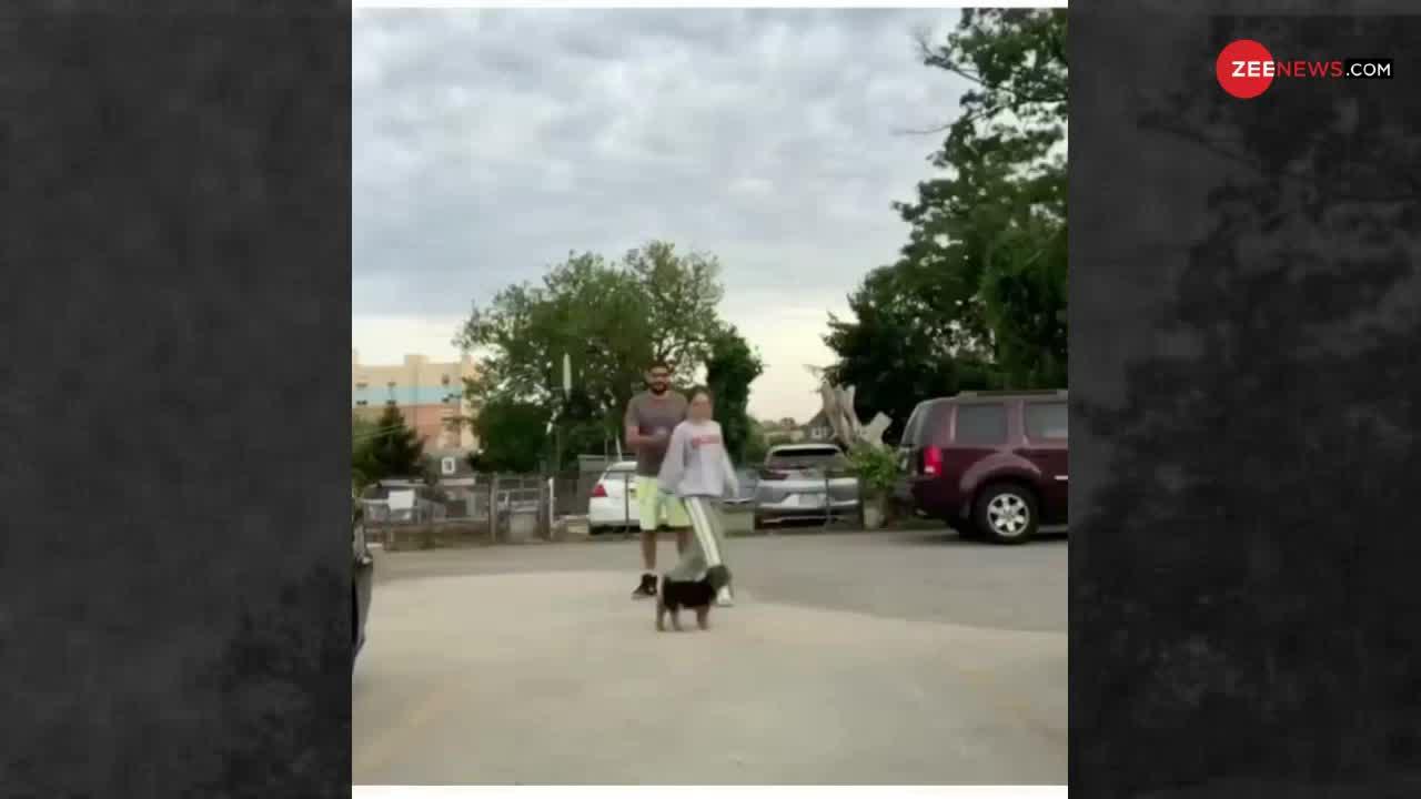 Viral Video : ये है कमाल का Couple चैलेंज, कुत्ते को बीच में खड़ा कर देखें किससे ज्यादा प्यार करता है!