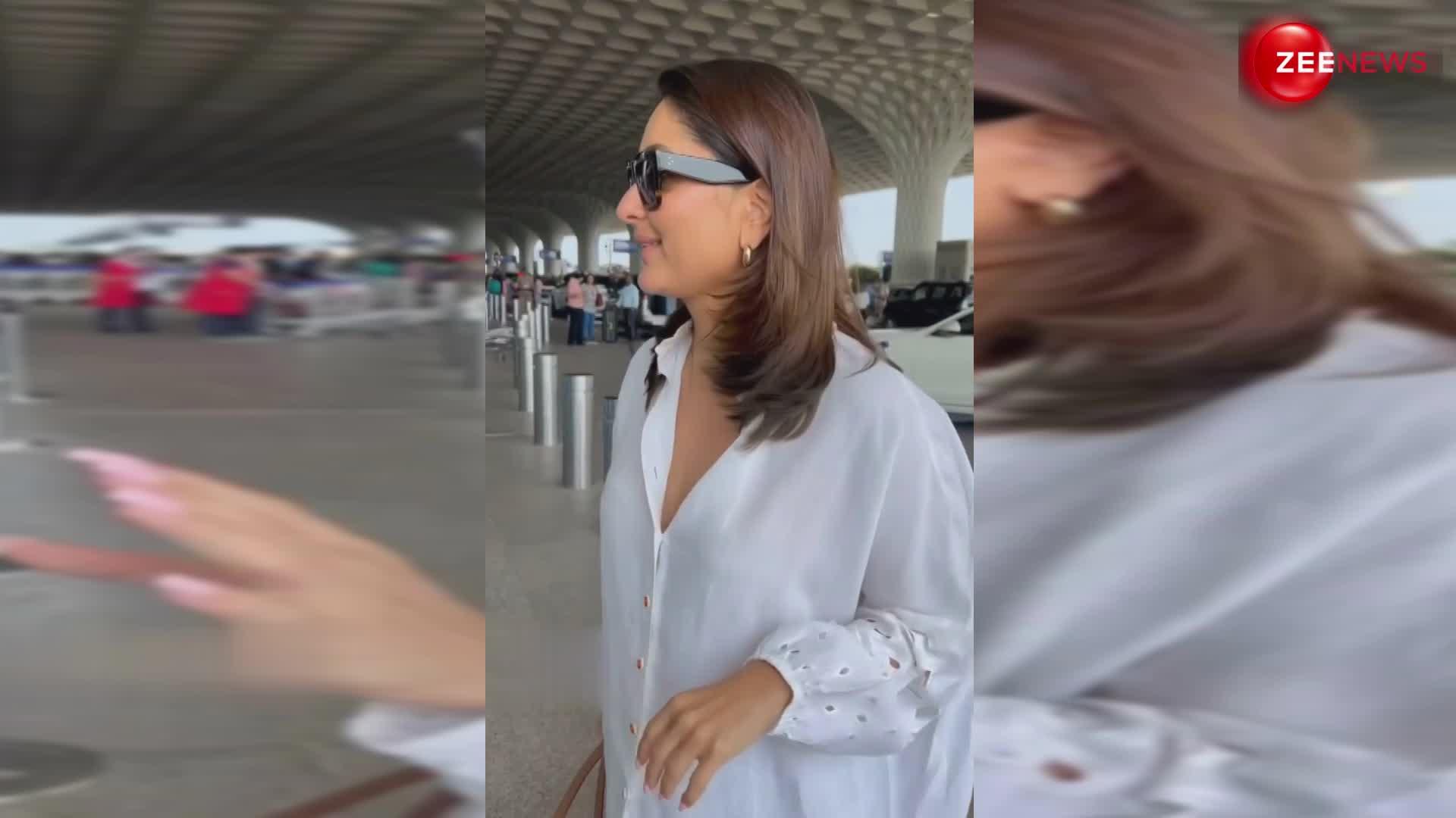 ढीली शर्ट पहने एयरपोर्ट पर नजर आईं Kareena Kapoor, फ्लॉन्ट कर रही हैं कैजुअल लुक