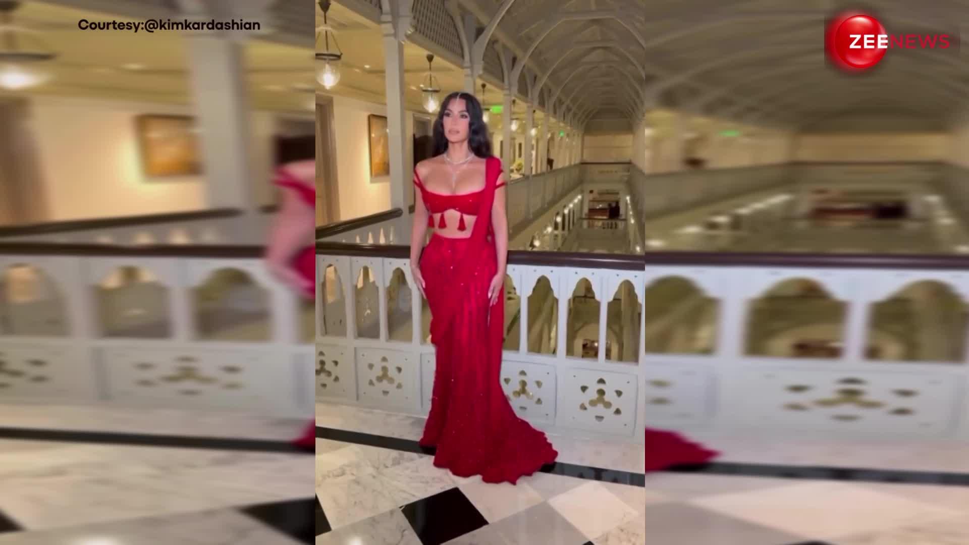 इंडिया आकर देसी लुक में फिट हुईं Kim Kardashian, अनंत की शादी में पहनी चमकीली लाल साड़ी