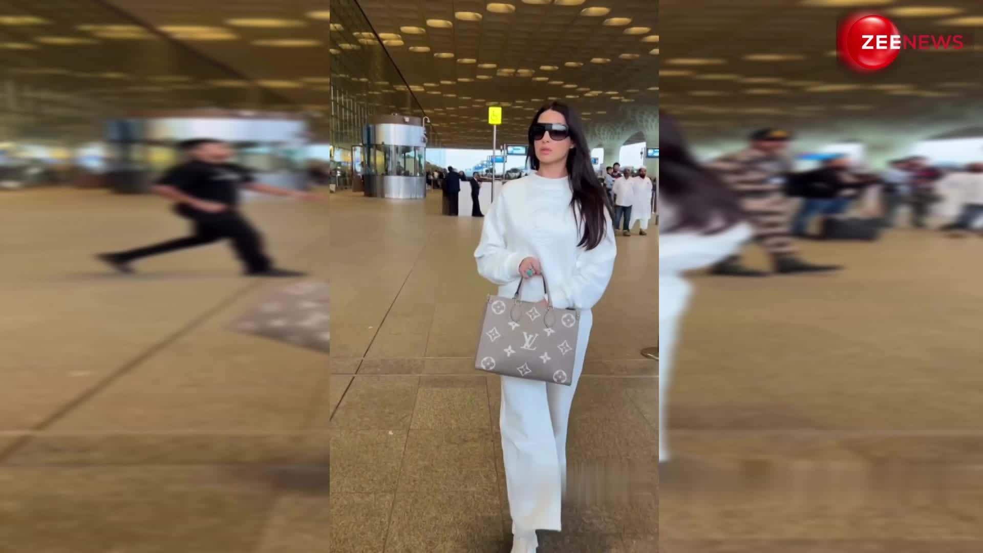 एयरपोर्ट पर व्हाइट कोजी आउटफिट में नजर आईं Nora Fatehi